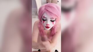 Belle Delphine Teases In Vibrant Rainbow Bodysuit