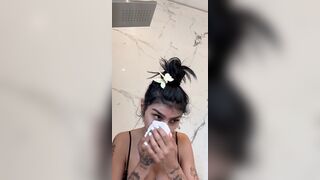 Mia Khalifa Performs A Steamy Strip Tease In The Shower